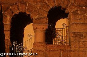 Archways in stone wall