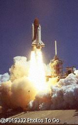 Space shuttle lifting off during launch